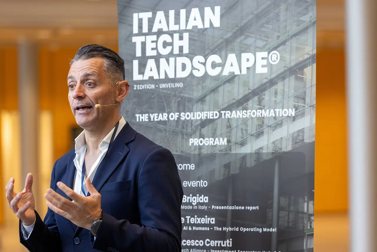 An interview next to the programme banner